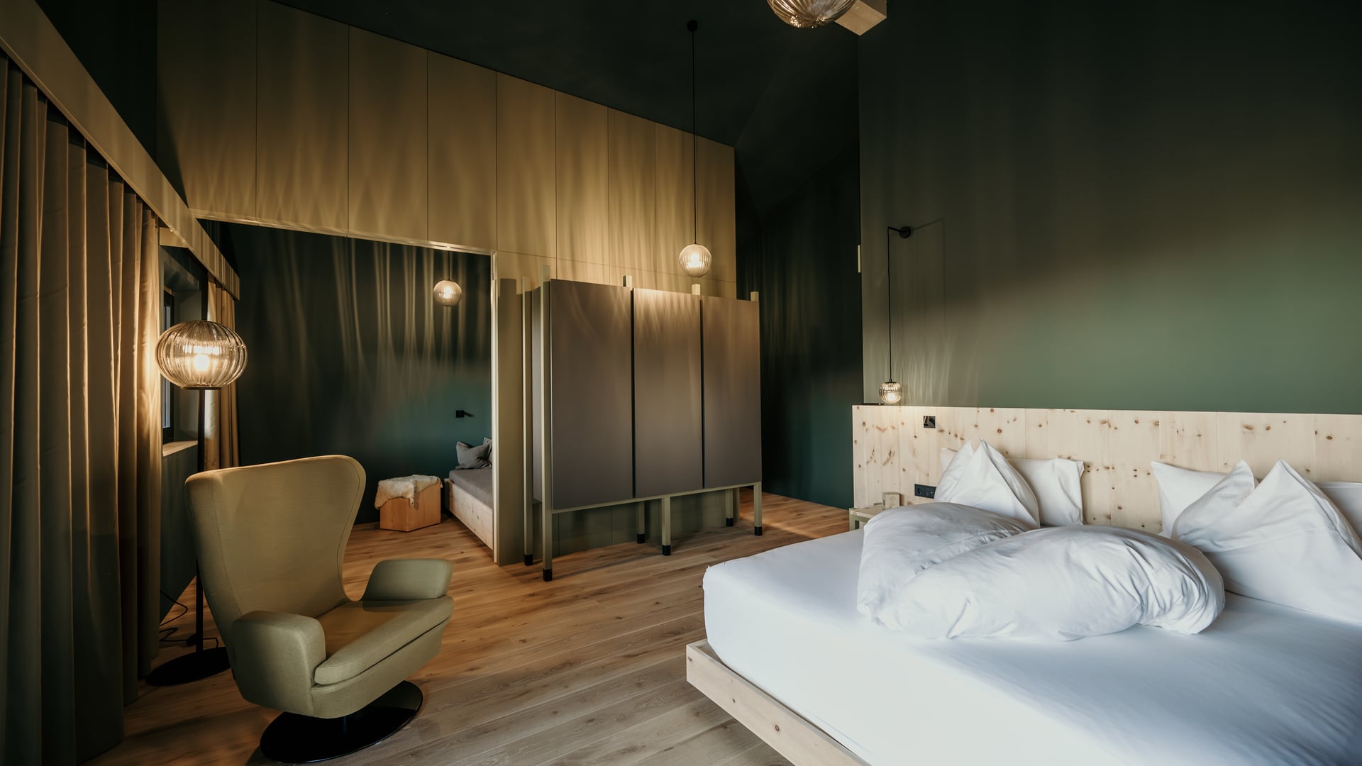 The calm of Swiss pine in the heart of the Dolomites Natursuite Arve with Swiss pine wood, large glass front and view of the Dolomites