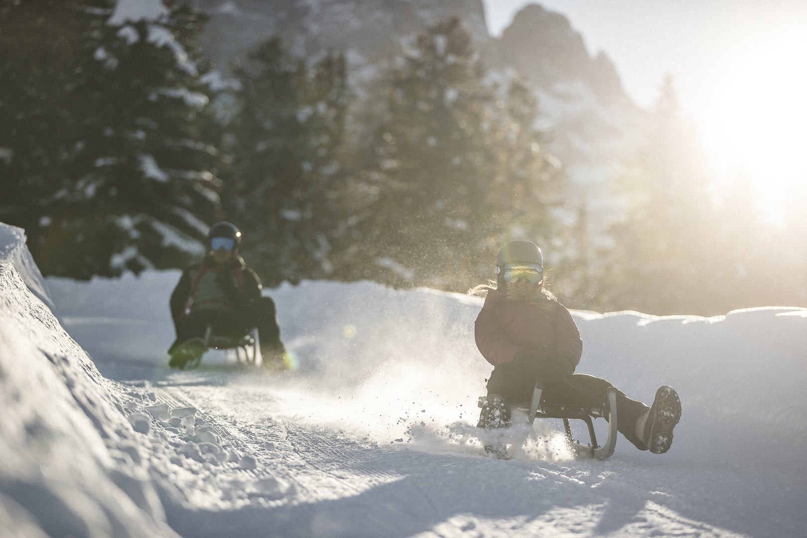 Tobogganing on ski holiday in the Dolomites